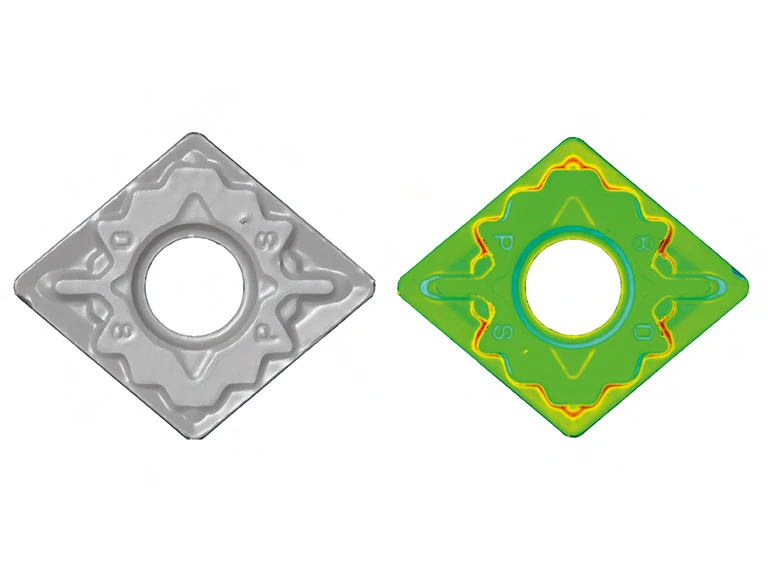 Zwei rautenförmige Metalleinsätze mit zentralen Löchern; der linke Einsatz ist in Graustufen dargestellt, während der rechte Einsatz mit einer farbcodierten Spannungs- oder Wärmekarte in Grün-, Gelb- und Rottönen überlagert ist.